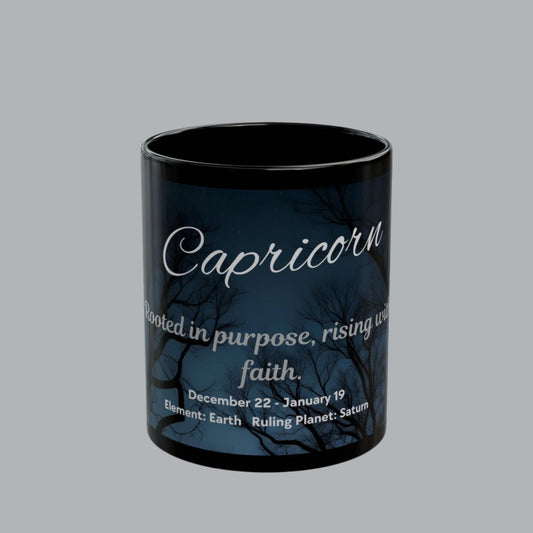 Black mug with Capricorn zodiac design and text on a white background